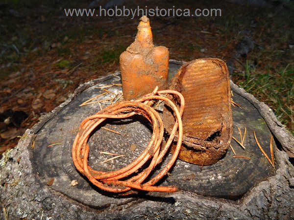 Pioneer wire, fish tin and losantine bottle.