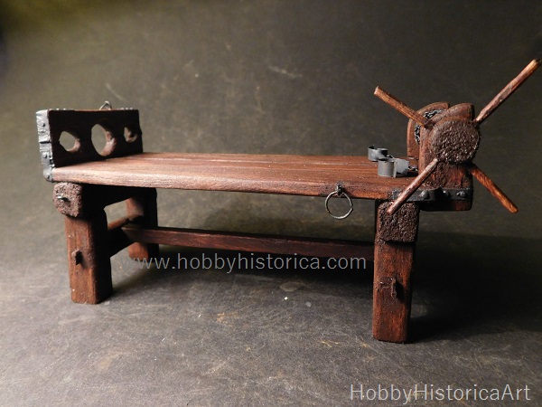 miniature torture instrument